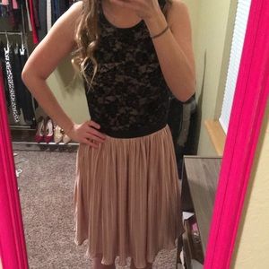 Gorgeous champagne and black formal dress